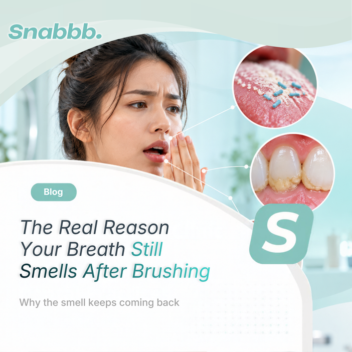 Person checking their breath after brushing, with close-up visuals showing tongue bacteria, plaque buildup, and dry mouth as possible causes of persistent bad breath.