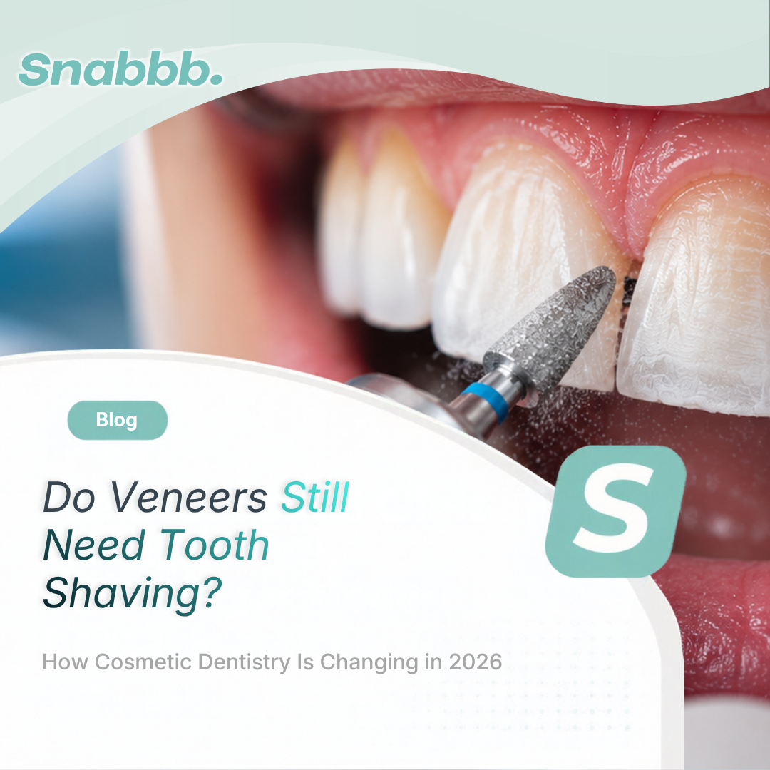 Close-up of a dentist performing veneer tooth preparation, using a rotary bur to carefully reduce enamel before dental veneer placement.